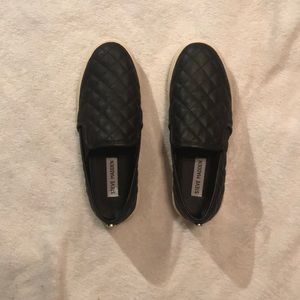 Black and white Steve maddens